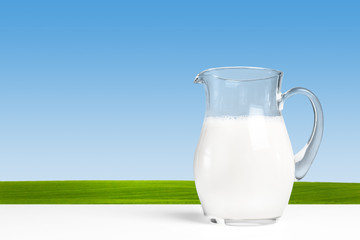 Pitcher  with some milk