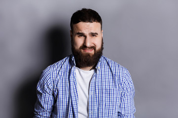 Feeling upset, sad bearded man portrait