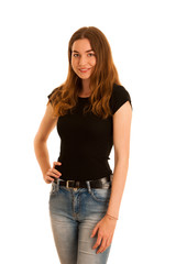 attractive young woman in jeans and black t shirt isolated over white background