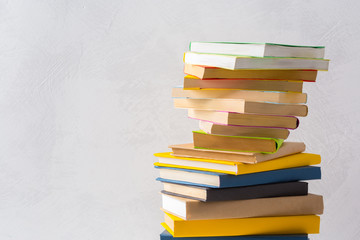  pile of paperback books on a table