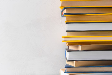  pile of paperback books on a table