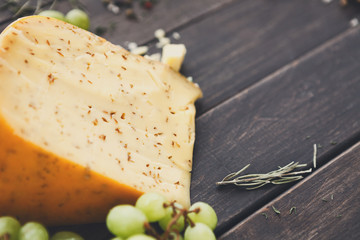 Gouda cheese with herbs closeup