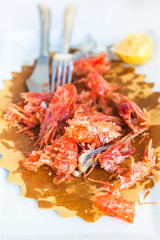 plate with the remains of seafood after lunch
