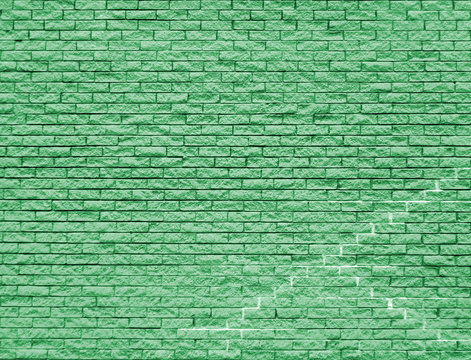 green brick wall background with old cracks and textures