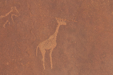 Bushman prehistoric rock engravings at the UNESCO World Heritage Center in Twyfelfontein Namibia