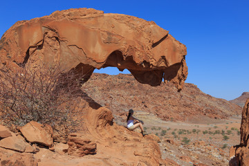 Tourist at Twyfelfontein, UNESCO World Heritage Center, Namibia