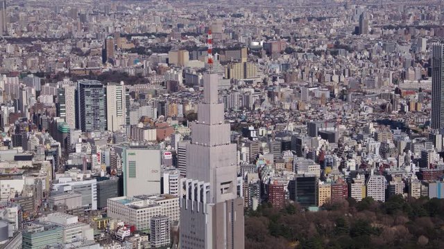 Japan Tokyo Aerial v2 Flying around NTT Docomo clock tower with Shinjuku cityscape views 2/17