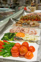 BBQ with raw meat for cook