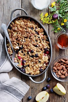 Gluten-free Apple And Berry Crisp. Fruits Crumble With Oats And Almond Crunch. 