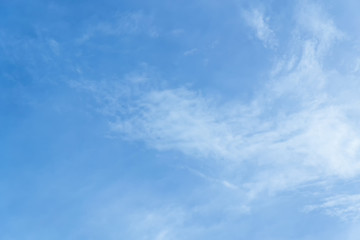Blue sky with clouds background lines intersect.