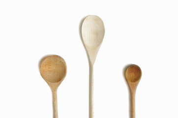 Set of wooden kitchen spoon isolated on white background. Cooking concept kitchen background.