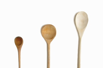 Set of wooden kitchen spoon isolated on white background. Cooking concept kitchen background.