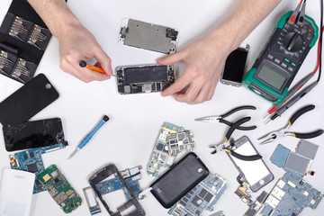 Repairing smartphone, dissasembling phone top view