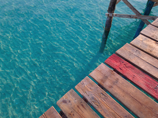 Sea pier in Playa de Muro beach, Mallorca, Spain