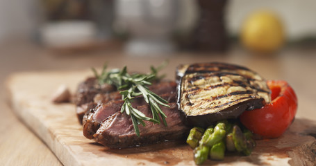 piece of rib eye steak with vegetables