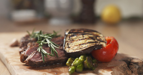 piece of rib eye steak with vegetables