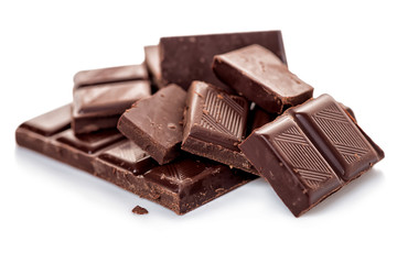 broken dark chocolate isolated on white background