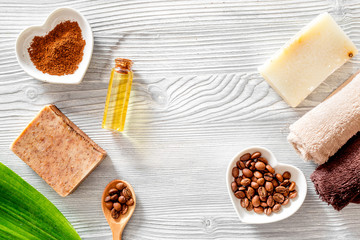 Organic skin care. Coffee soap on wooden table background top view copyspace
