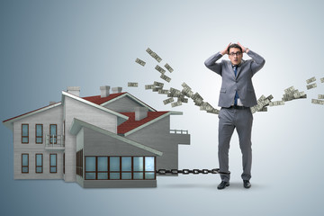 Businessman in mortgage debt financing concept