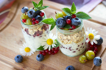Superfoods: pudding with chia seeds, currants, oatmeal and yoghurt