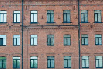 Construction Worker Installing New Windows In House