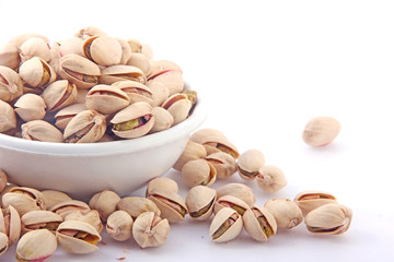 Pistachios in white bowl