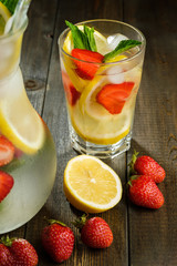 Lemonade with lemon and strawberry, mint and ice