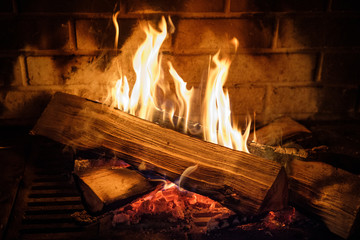 fire burns in the fireplace