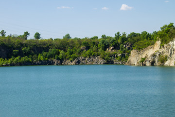 Fototapeta na wymiar Lake at abandoned quarry