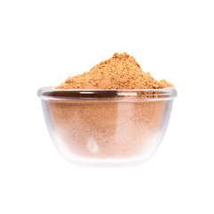 Yellow curry powder in saucepan, macro shot.