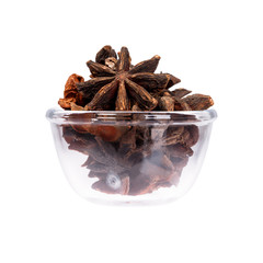 Dried cloves in saucepan, macro shot.