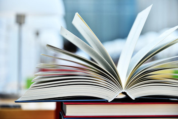 Books lying on the table in the public library