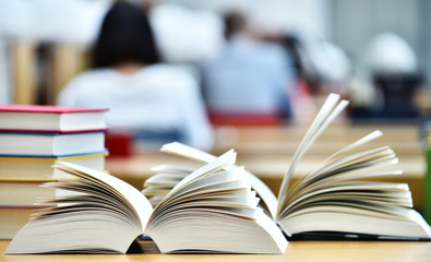 Books lying on the table in the public library