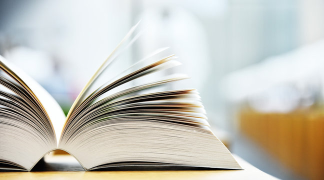 Books lying on the table in the public library