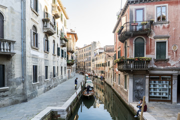 Venice, Veneto, Italy. May 21, 2017: Narrow channel called "Rio de le Muneghete" and anchor Sacchere