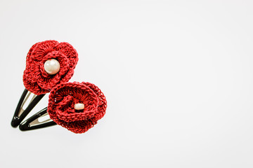 hair clips made from yarn on white background