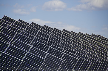 Solar Panels in Power Plant with Sangre de Cristo Mountains