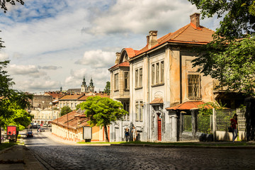 Street of the city of Lviv with old houses. Stone road in the old town. Urban retro landscape