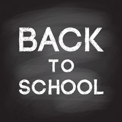 Vector illustration of words Back to school handwritten with white chalk on a school blackboard