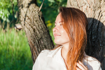 Young woman outdoors portrait.