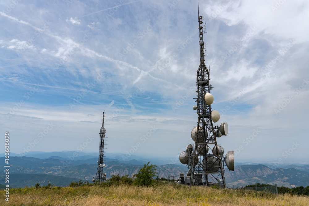 Wall mural telecom cellular Communication Antenna tower on blue background