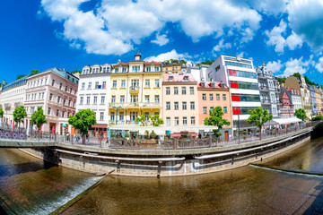 Tepla River embankment with hotels and restaurants. Karlovy Vary, Czech Republic