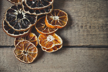 Fototapeta na wymiar Dried citrus fruits cut into rings (slices)
