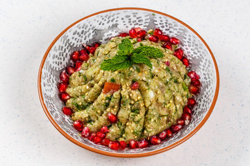 Raheb Salad served with pomegranate.