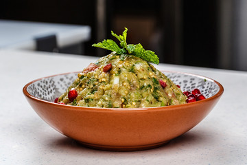 Raheb Salad served with pomegranate.