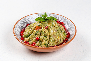 Raheb Salad served with pomegranate.