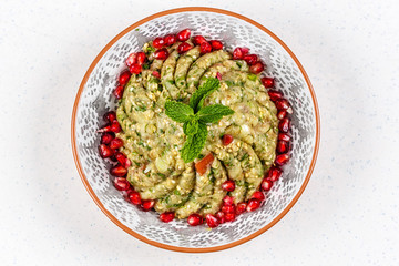 Raheb Salad served with pomegranate.