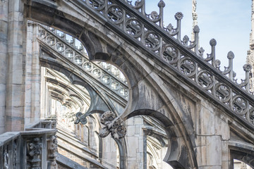 Detail of Milan Cathedral or Duomo di Milano, Gothic church located in the historical center of Milan, Italy.