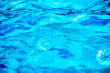 Surface of the pool water as a background