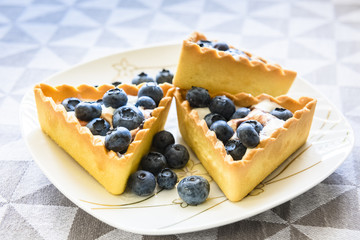 cakes with cream and berries